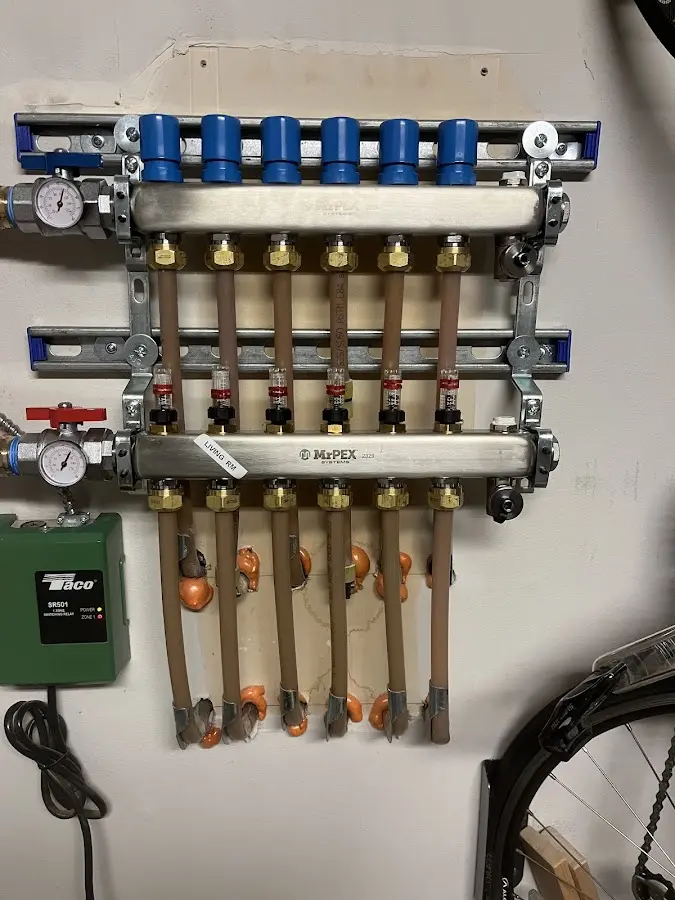 Plumber performing Water Heater Repair at a residential property in Secaucus